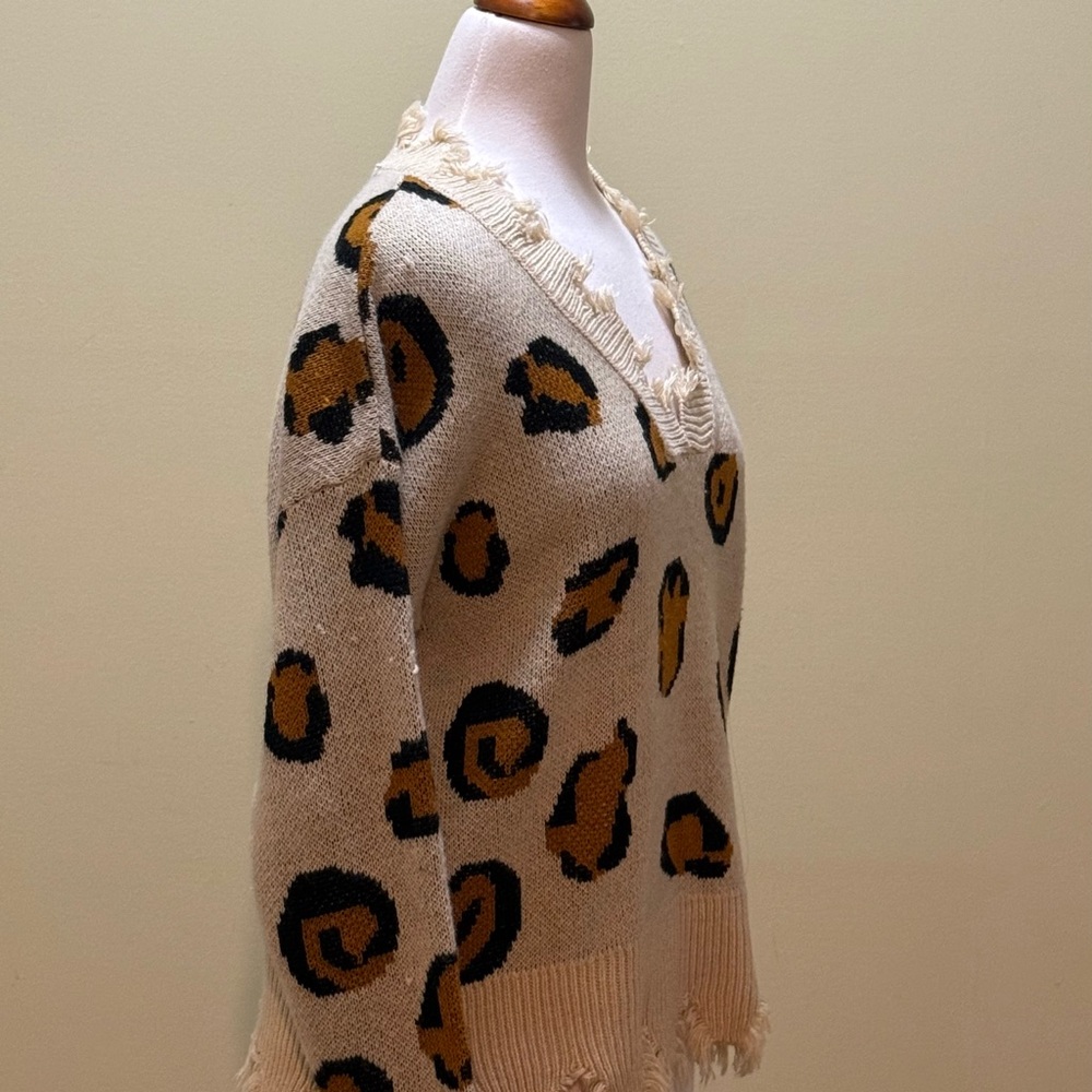 Chic Leopard V-Neck Sweater with Fringe